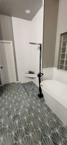 Tub and shower area in progress