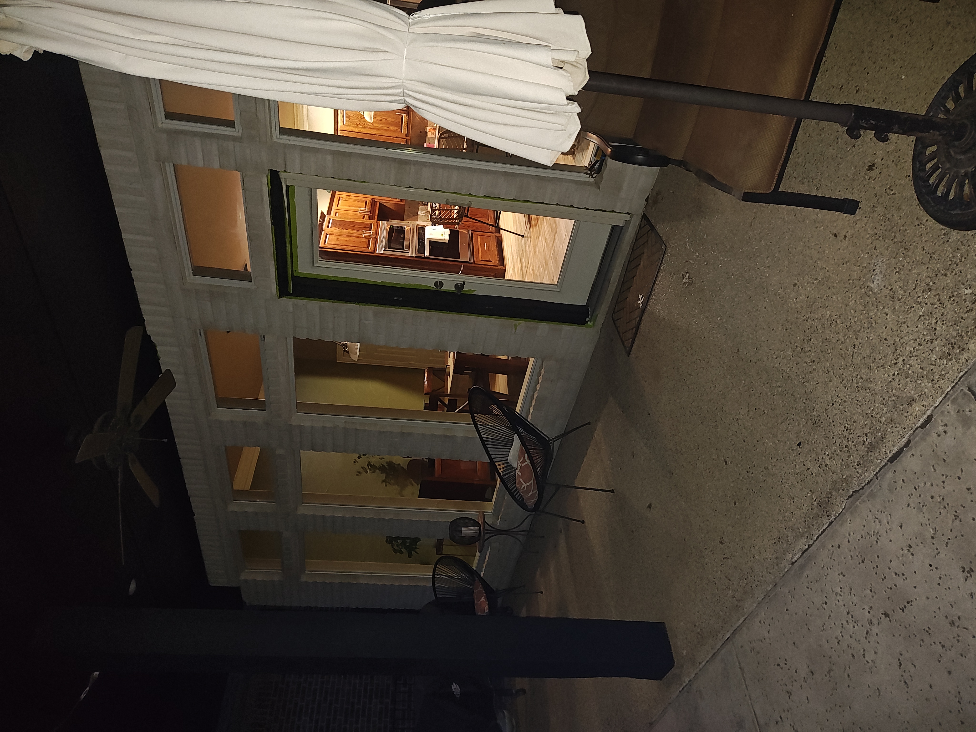Exterior trim at night after painting completion